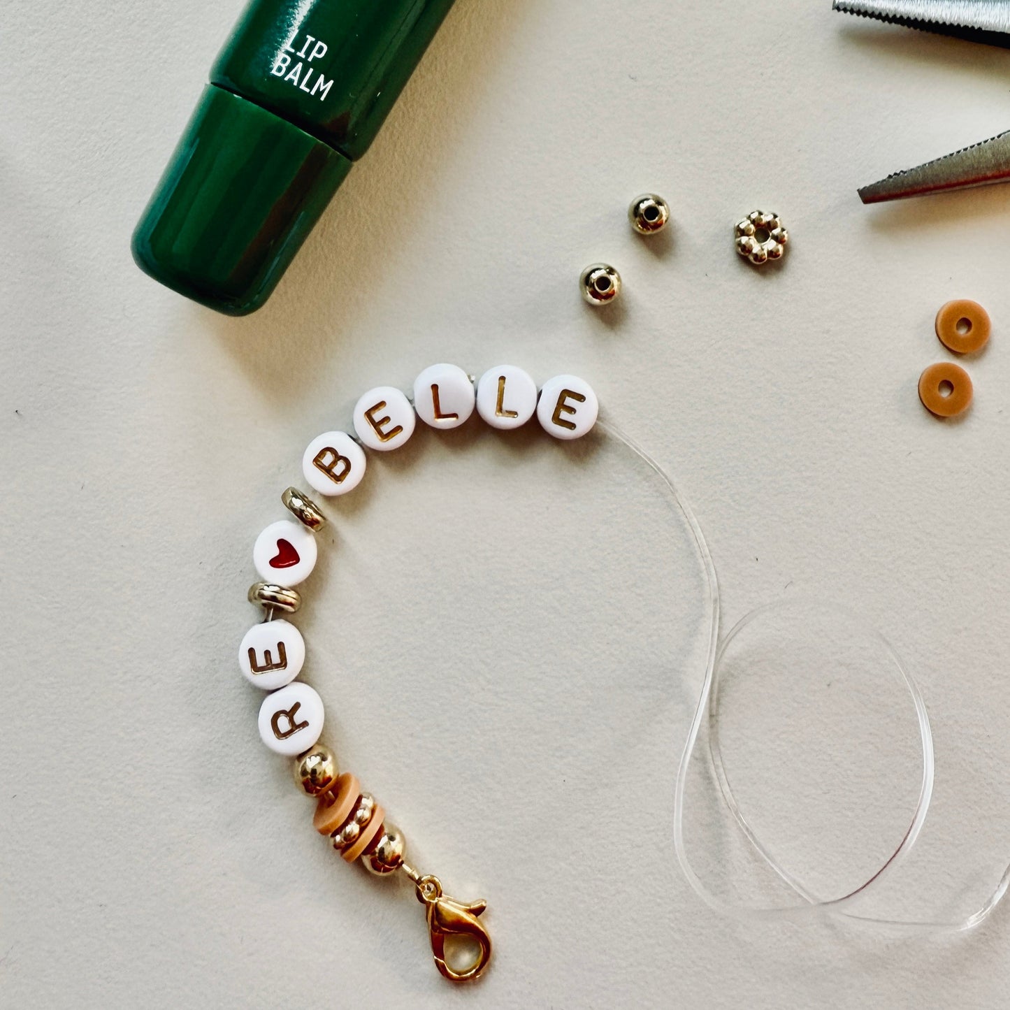 The Lip Balm with reBELLE Chain